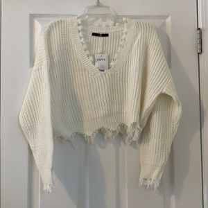 Distressed sweater